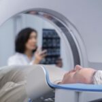 doctor-getting-patient-ready-ct-scan-7-min